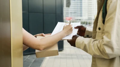 Which delivery company pays the most in the UK?