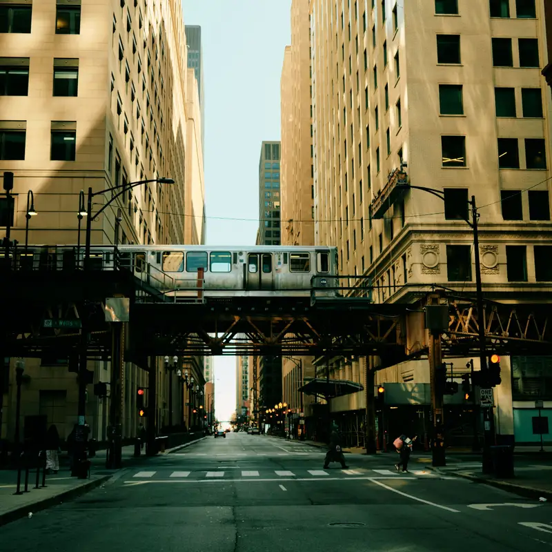 A CTA elevated train crossing above a street in the Chicago Loop