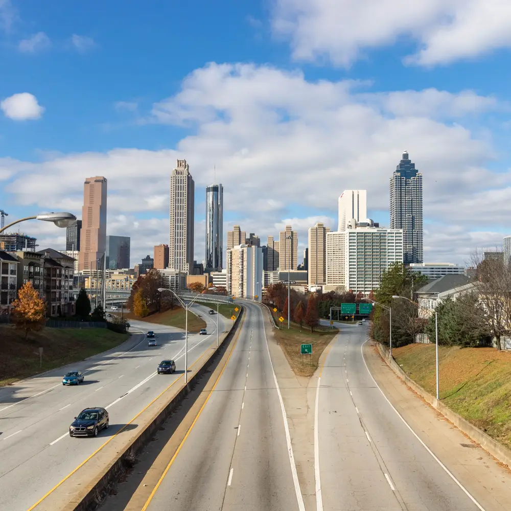 The Downtown Connector in Atlanta running towards the downtown skyline