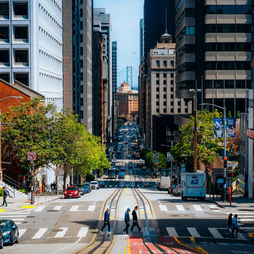 California Street in San Francisco on a clear morning, looking downhill towards the Bay Bridge