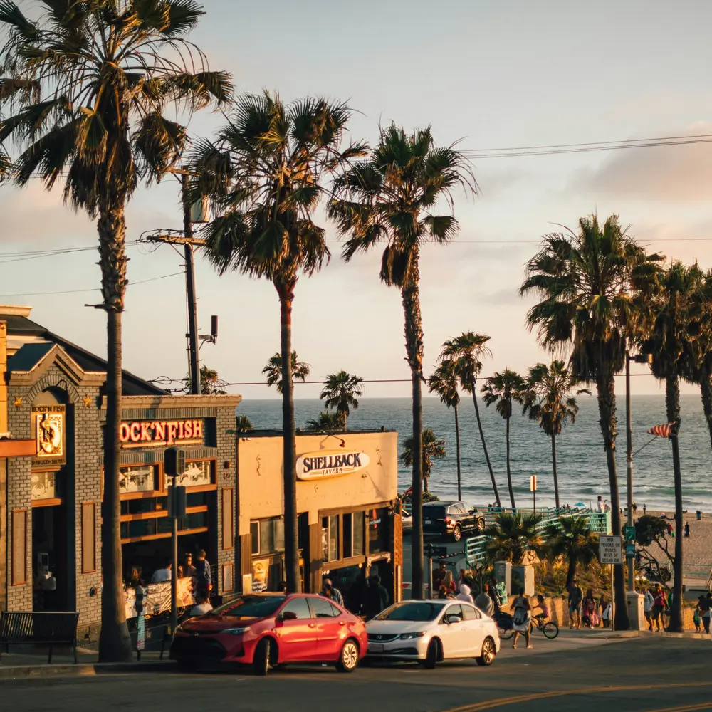 A palm lined beachfront street on the Los Angeles Westside at sunset