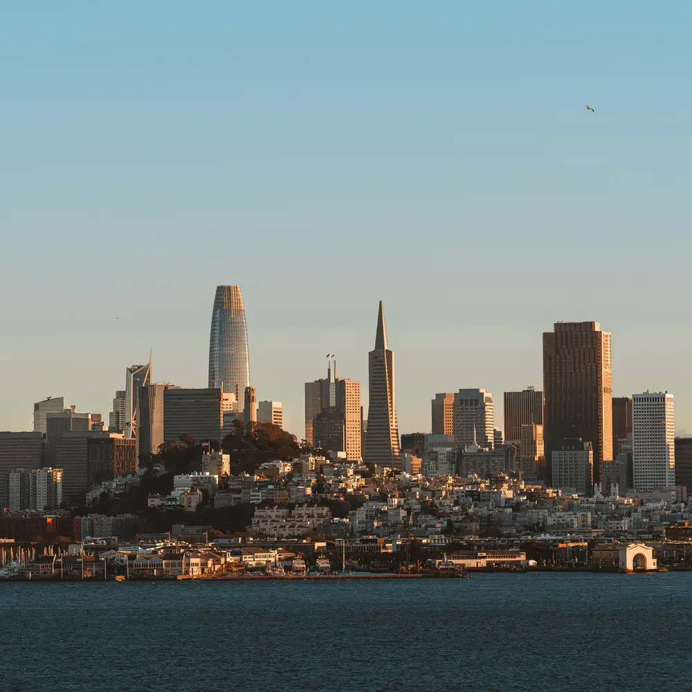 The San Francisco skyline seen across the bay at sunset